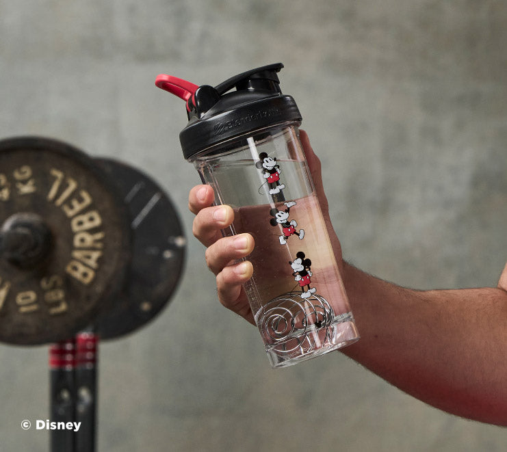 pro-series-f9 Mickey_Mouse_Protein_Shaker_Bottle_Being_Held_In_the_Gym.jpg